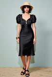 Robe d’invitée de mariage midi à manches bouffantes noire