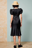 Robe d’invitée de mariage midi à manches bouffantes noire