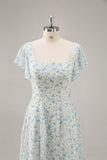 Robe de demoiselle d’honneur longue à volants en mousseline de soie fleurie bleue avec fente