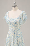 Robe de demoiselle d’honneur longue à volants en mousseline de soie fleurie bleue avec fente