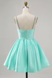 Robe courte de retour en satin fuchsia avec perles