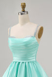 Robe courte de retour en satin fuchsia avec perles