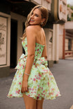 Robe de cocktail corset floral trapèze sans bretelles verte avec noeuds