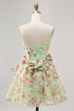 Robe de cocktail corset floral trapèze sans bretelles verte avec noeuds