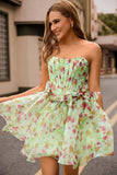 Robe de cocktail corset floral trapèze sans bretelles verte avec noeuds