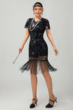 Robe noire à paillettes dorées des années 1920 avec franges