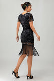 Robe noire à paillettes dorées des années 1920 avec franges