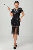 Robe noire à paillettes dorées des années 1920 avec franges