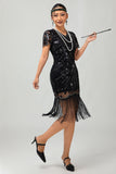 Robe noire à paillettes dorées des années 1920 avec franges