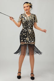 Robe noire à paillettes dorées des années 1920 avec franges