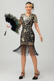 Robe noire à paillettes dorées des années 1920 avec franges