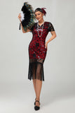 Robe noire à paillettes dorées des années 1920 avec franges