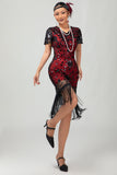 Robe noire à paillettes dorées des années 1920 avec franges