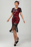 Robe noire à paillettes dorées des années 1920 avec franges