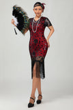 Robe noire à paillettes dorées des années 1920 avec franges