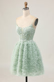 Robe de bal corset trapèze vert sauge avec appliques