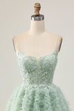 Robe de bal corset trapèze vert sauge avec appliques