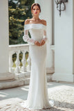 Robe de mariée à manches longues fourreau ivoire à épaule dénudée