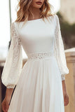 Robe de mariée en dentelle ivoire à manches longues avec fente