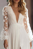 Robe de mariée plissée ivoire à manches longues