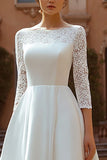 Robe de mariée ivoire col bateau une ligne dentelle