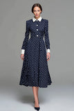 Robe trapèze en satin bleu marine à manches longues à pois