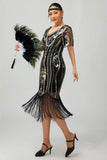 Flapper noir à paillettes dorées Robe moulante à franges des années 1920