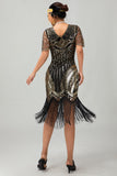 Robe moulante moulante à paillettes dorées noires des années 1920 avec pompons