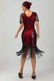 Robe moulante moulante à paillettes dorées noires des années 1920 avec pompons