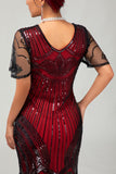 Robe moulante moulante à paillettes dorées noires des années 1920 avec pompons
