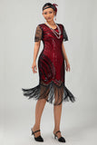 Robe moulante moulante à paillettes dorées noires des années 1920 avec pompons