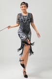 Robe moulante moulante à paillettes dorées noires des années 1920 avec pompons