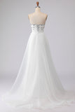 Robe de mariée longue blanche en satin perlée brette sans bretelles
