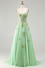 Corset vert à perles avec fines et longue robe de bal