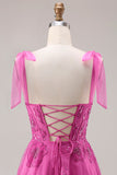 Robe de bal longue Burnot fleurie perlée en fuchsia avec dentelle dans le dos