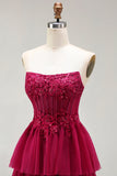 Corset à fuchsia à volants à volants en fuchsia avec une robe de bal longue et fente