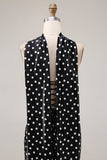 Robe de soirée en satin satin à pois noirs blancs avec une écharpe au col