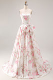 Robe longue de bal noire rose sans bretelles à motifs floraux avec nœud