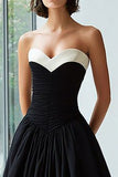 Robe formelle bustier en satin noir et blanc une ligne