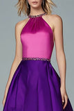 Robe formelle perlée fuchsia et violet haut bas nu scintillant