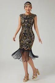 Robe années 20 noire et dorée moulante à franges et paillettes