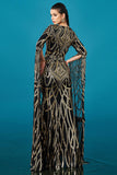 Robe formelle noire sirène dorée à manches longues à sequins