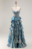 Robe de soirée longue trapèze bleu métallisé à corset ornée de perles