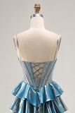 Robe de soirée longue trapèze bleu métallisé à corset ornée de perles