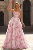 Robe de bal longue de bal en fleur fluminse blanche en fleur fûche fuchsia sans bretelles taille basque en ligne A