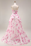 Robe de bal longue de bal en fleur fluminse blanche en fleur fûche fuchsia sans bretelles taille basque en ligne A