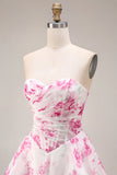 Robe de bal longue de bal en fleur fluminse blanche en fleur fûche fuchsia sans bretelles taille basque en ligne A