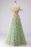 Robe longue de bal longue décapotable fleurie dénudée à l’épaule