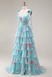 Bleu Rose Fleur Une robe de bal longue en chiffon à volants avec fente