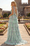 Bleu Rose Fleur Une robe de bal longue en chiffon à volants avec fente